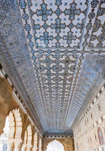 Architectural detail of the Sheesh Mahal (Mirror Palace) at Amer Fort in Jaipur, India.