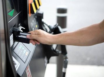 "paying for gas, small DOF.  Other images from this series:"