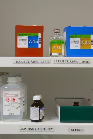 Modern hospital storage facilities, shelves of products for treatment and hospital procedures.