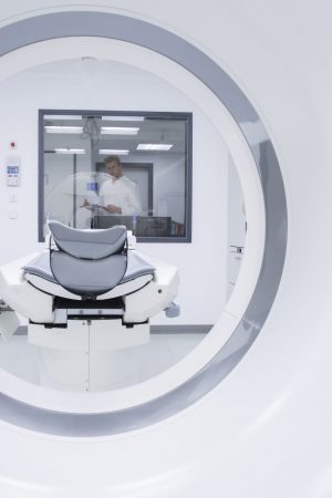 Radiologist in hospital, computer tomograph